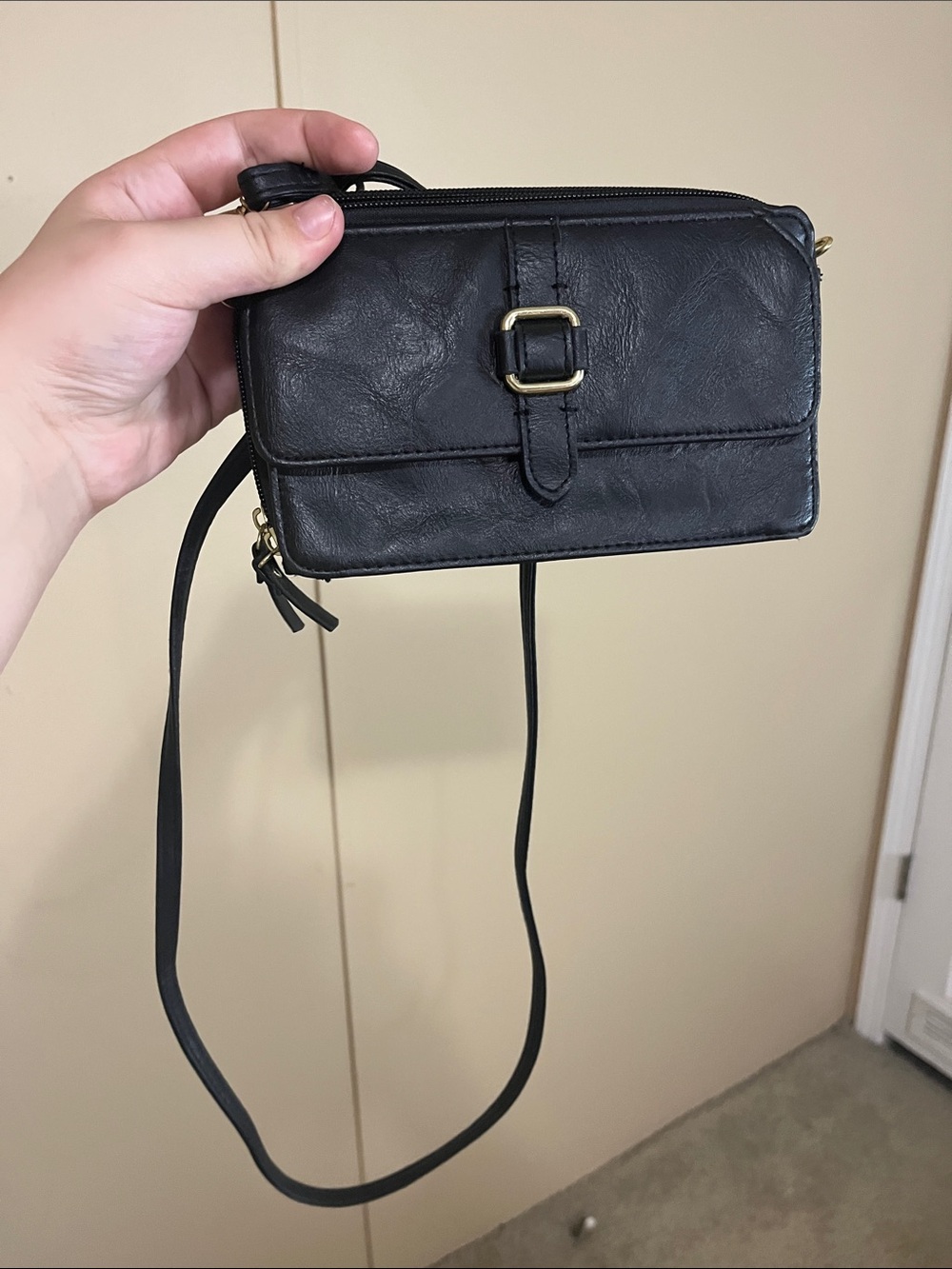 black crossbody with front buckle
